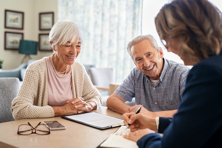 senior placement advisor assisting a senior couple with senior care options